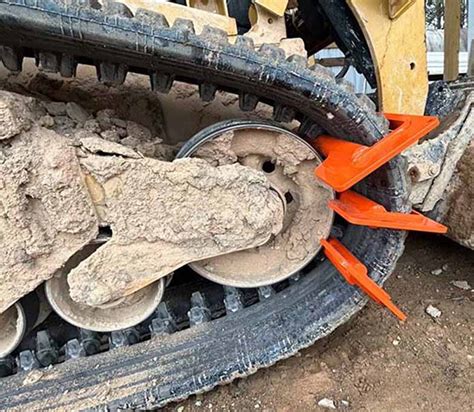 how to replace tracks on a skid steer|changing tracks on skid steer.